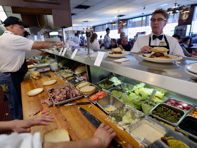 LOS ANGELES, CA - FEBRUARY 26:  Pastrami sandwiches are prepared at Langer's Delicatessen on February 26, 2013 in Los Angeles, California. According to a report, America's Jewish delis are struggling to stay afloat. There were several thousand Jewish delis open in New York City during the first half of the 20th century, now there are only a few dozen.  (Photo by Kevork Djansezian/Getty Images)