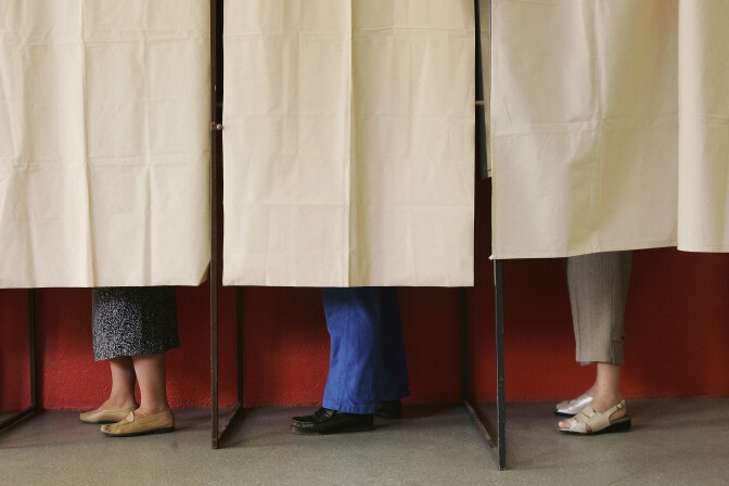 MELLE, FRANCE - MAY 06:  People cast their ballots in the morning of the final round of French presidential elections May 6, 2007 in Melle, France. France is choosing between conservative candidate Nicolas Sarkozy and Socialist candidate Segolene Royal in a race that the last polls show Sarkozy with a significant lead.  (Photo by Sean Gallup/Getty Images)