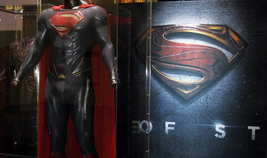 The Superman costume worn by Henry Cavill in the highly anticipated theatrical film "Man of Steel" is on display at the Warner Bros. Consumer Products' booth at Licensing Expo 2012.