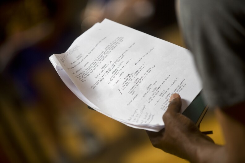 Baron Davis holds a script for a scene from "Chinatown" during the final day of Joan Scheckel's three-day lab on Sunday, May 3, 2015 at Scheckel's Hollywood studio called "The Space."