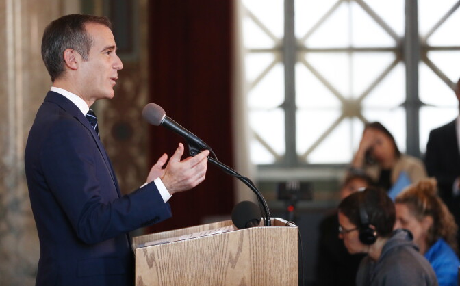 LOS ANGELES, CALIFORNIA - JANUARY 03:  Los Angeles Mayor Eric Garcetti (L) speaks at a press conference at City Hall announcing the launch of the 'ShakeAlertLA' mobile application on January 3, 2019 in Los Angeles, California. 'ShakeAlertLA' is the country's first publicly available early earthquake warning app. The app uses the USGS earthquake sensor network to potentially provide users with seconds of advance notice before shaking from an earthquake begins.  (Photo by Mario Tama/Getty Images)