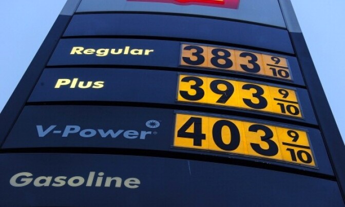 A sign shows gasoline prices at a gas station in Carson, California March 2, 2011.