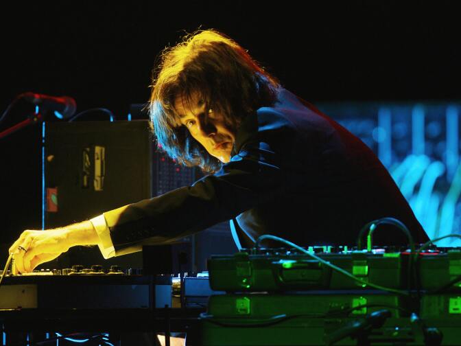 French musicien Jean-Michel Jarre performs the live show "Oxygene" 30 years after its creation, at the Marigny theatre in Paris 12 Decembre 2007.  AFP PHOTO / PATRICK HERTZOG (Photo credit should read PATRICK HERTZOG/AFP/Getty Images)