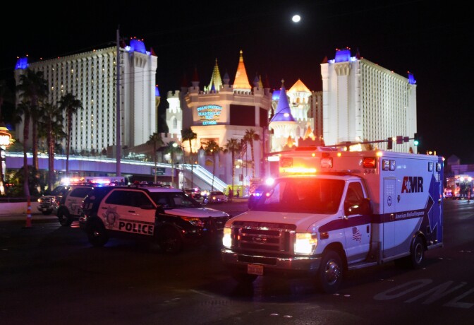 File: An ambulance leaves the intersection of Las Vegas Boulevard and Tropicana Ave. after a mass shooting at a country music festival nearby on Oct. 2, 2017 in Las Vegas, Nevada.