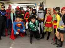 Comic enthusiasts dressed as comic book characters including Batman, Spiderman and Superman pose for photos as they attend a Free Comic Book Day event in Manila, Philippines on May 3, 2014.