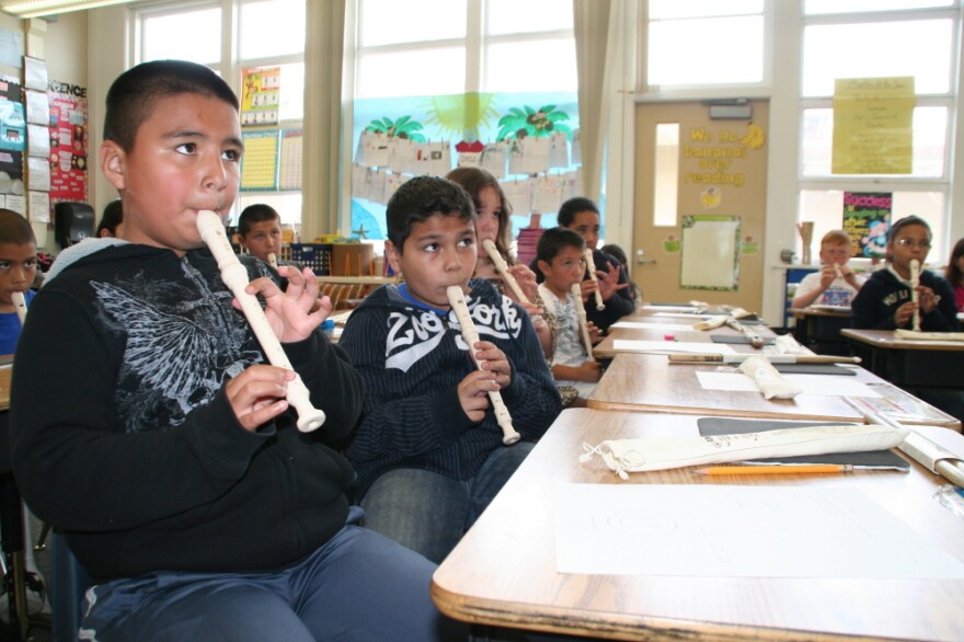 Students play the recorder in Academic Music class at Allen Elementary School in San Bruno, Calif. Teachers are using music notes to teach fractions.