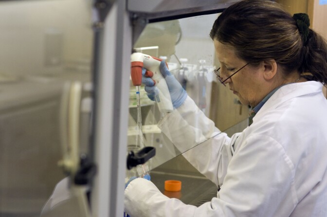 TO GO WITH AFP STORY by Justine Gerardy ===  A medical technician works at the South African Tuberculosis Vaccine Initiative (SATVI) at Brewelskloof Hospital, on January 27, 2011, in Worcester, South Africa. The infant is one of 2,784 volunteers in a two-year-trial in South Africa's winelands that scientists hope will lead to a new jab against the lung disease that kills one person every 20 seconds worldwide. South Africa is a prolific testing ground with the world's second heaviest rate of TB after Swaziland, according to SATVI, and preys on weakened immune systems due to high HIV levels which affects 5.7 million of the 48 million population. AFP PHOTO/RODGER BOSCH (Photo credit should read RODGER BOSCH/AFP/Getty Images)