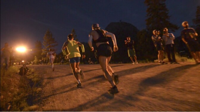 Racers start off in the darkness at the Western States 100-Mile Endurance Run.