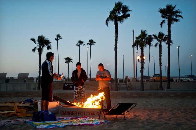 The Los Angeles County Board of Supervisors and many Orange County residents are in support of keeping beach fire pits. Local air regulators say the burning wood produce carcinogens similar to that of smoking a pack of cigarettes or inhaling diesel engine fumes.