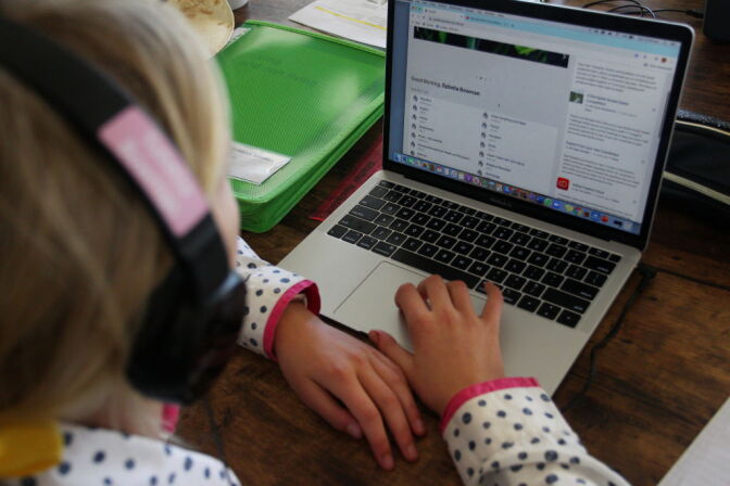 TARPOLY CREEK, AUSTRALIA - APRIL 05: Sybella Bowman, 12, does school work at her family home and cattle property on April 05, 2020 in Tarpoly Creek, Australia. Emily Bowman, mother of three, believes the current internet situation highlights "the great divide between city and country." She is currently paying $400 per month for a recently expanded package and considering hiring a space in Tamworth (100 km away from her home) so she can access better internet to home school her children. " We are in the technological dark ages in rural Australia, the service is expensive and unreliable", stated Emily. As boarding schools have closed due to the COVID-19 pandemic, many rural families are now teaching their children from home. With no access to high-speed fixed-line connections they rely solely on satellite internet which is proving problematic and costly, particularly for the use of streaming and video apps such as Zoom - a prominent component in most online teaching. (Photo by Lisa Maree Williams/Getty Images)