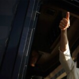Republican presidential candidate Rep. Michele Bachmann (R-MN) give a thumbs-up to her supporters from her bus after winning the Iowa Straw Poll outside the Hilton Coliseum at Iowa State University August 13, 2011 in Ames, Iowa.