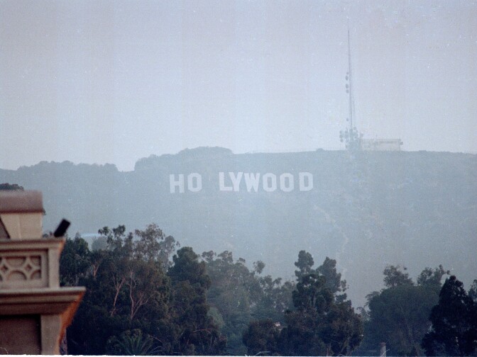 The Hollywood sign is seen after pranksters altered the sign by removing one 'L' to read 'Holywood' during the early morning hours before the arrival of Pope John Paul II for two-day visit in Los Angeles, Calif., Tuesday, Sept. 15, 1987.

