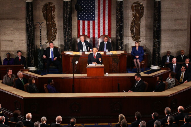 President Barack Obama, flanked by Vice President Joe Biden (L) and Speaker of the House John Boehner (R-OH) delivers his State of the Union address on January 24, 2012 in Washington, DC.