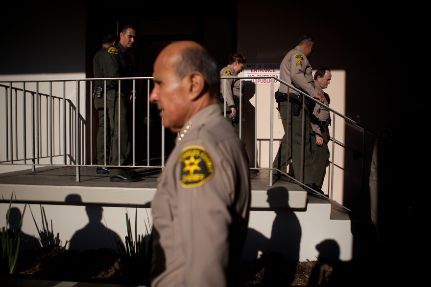 L.A. County Sheriff Lee Baca conducts an inspection of Men's Central Jail in Downtown Los Angeles in this photo from December 2011.