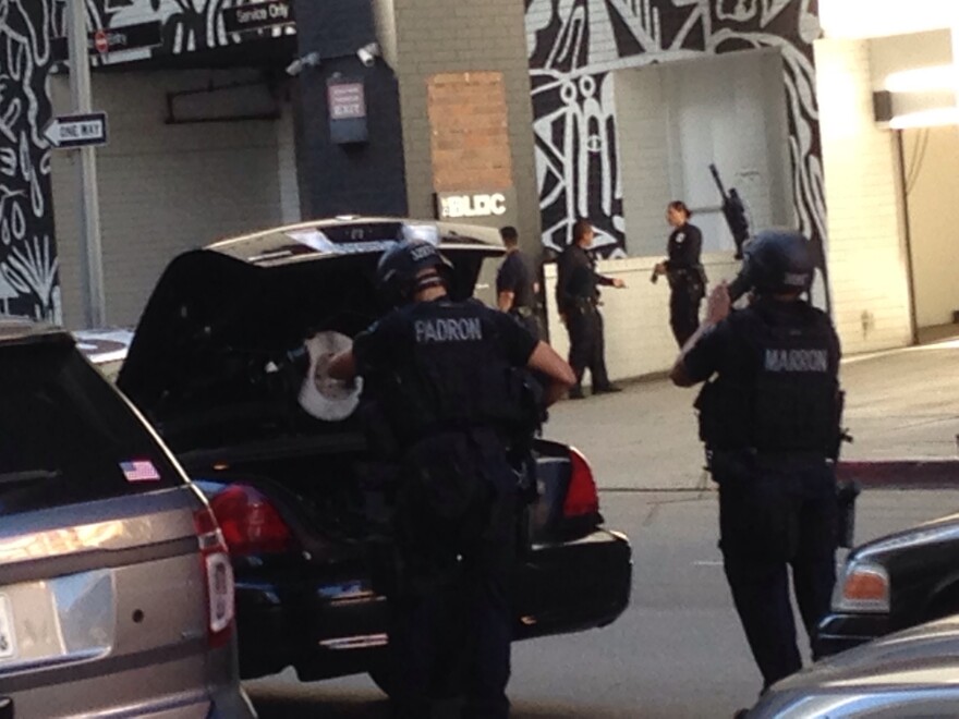 LAPD officers respond to a shooting at the Gas Co. Lofts in downtown Los Angeles on October 22, 2016