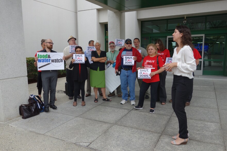 Members of Save Porter Ranch and Food & Water Watch and Consumer Watchdog gathered Aug. 26, 2016, at a state workshop on energy reliability to call for the Aliso Canyon Natural Gas Storage Facility to be shut down.