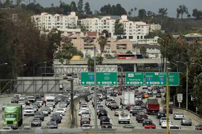 Traffic moves slowly on the 110 Freeway during afternoon rush hour in downtown Los Angeles on May 6, 2015. 