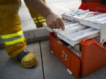 Firefighter paramedic Fred Gonzalez of Los Angeles County Fire restocks medical supplies after dropping off a patient at UCLA Medical Center and Orthopedic Hospital in Santa Monica on Monday morning, August 31, 2015. A UCLA-run pilot program starting Sept. 1 in Glendale and Santa Monica aims to reduce overcrowding, while also freeing up paramedics who get stuck waiting to pass off ER patients.