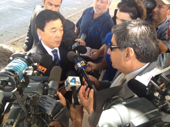LA sheriff's candidate Paul Tanaka answers questions after testifying in a deputy misconduct trial in federal court.