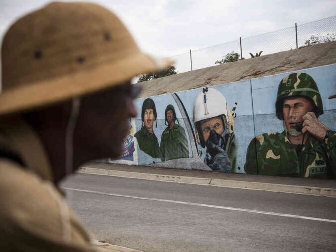 R.W. Williams, 63, a Vietnam veteran, has been seeking medical treatment for a host of ailments, including PTSD, at the VA health center in Los Angeles. He is seen here on the campus near a mural honoring soldiers.