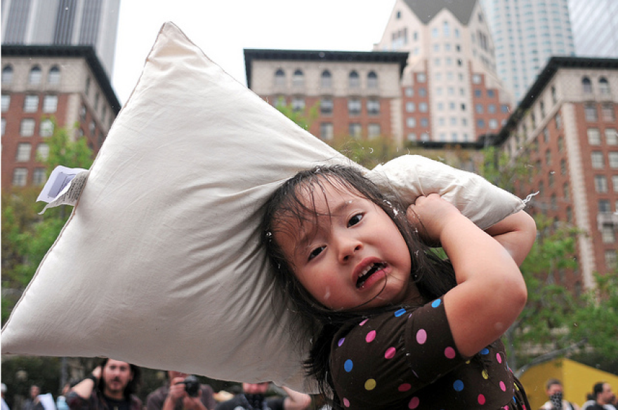 kid_with_pillow.png