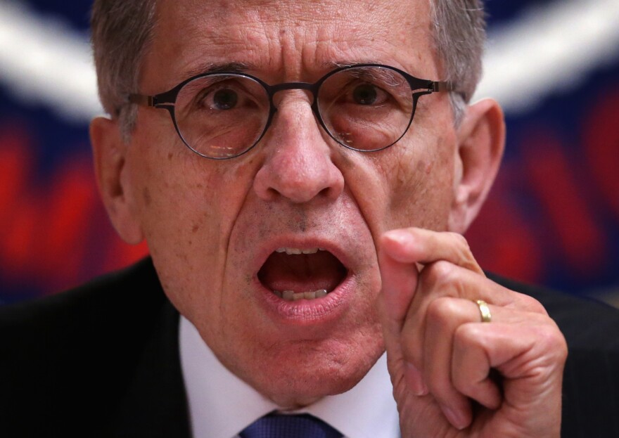 WASHINGTON, DC - MAY 15:  Federal Communications Commission (FCC) Chairman Tom Wheeler listens during an open meeting to receive public comment on proposed open Internet notice of proposed rulemaking and spectrum auctions May 15, 2014 at the FCC headquarters in Washington, DC. The FCC has voted in favor of a proposal to reform net neutrality and could allow Internet service providers to charge for faster and higher-quality service.  (Photo by Alex Wong/Getty Images)