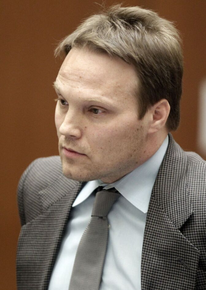 UCLA organic chemistry professor, Patrick Harran appears for his arraignment at Los Angeles Superior Criminal Courts building in Los Angeles on Wednesday, April 11, 2012. Harran is being charged in connection with a laboratory fire that killed a staff research assistant at UCLA in December 2008. Harran was released on his own reconnaissance as the court postponed the arrangement until June 7.  (AP Photo/Damian Dovarganes)