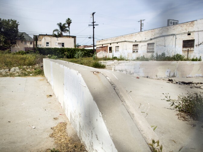 The site of a 27-story residential development on South Catalina Street in Koreatown is currently empty on April 6, 2016. One year ago, Mayor Eric Garcetti overturned a city planning commission decision to deny the development. 