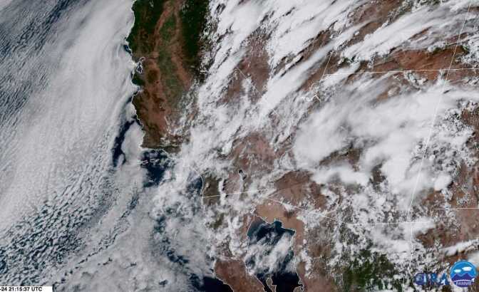 This live snapshot from an Earth-orbiting satellite shows monsoonal clouds over southern California from space at 4:30pm today. 