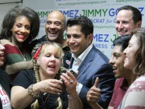 Jimmy Gomez takes a selfie with supporters at his election night celebration on June 6, 2017, in the Eagle Rock community of Los Angeles, California. Just moments after announcing that his opponent called to concede the race.