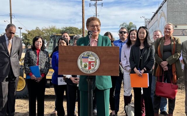 L.A. Mayor Karen Bass stands at a construction site in Boyle Heights to announce her executive order fast-tracking affordable housing approval in the city. 