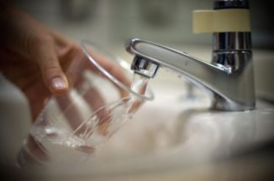 File: Water runs from a tap. Some Inland Empire residents have had funny smelling water recently.