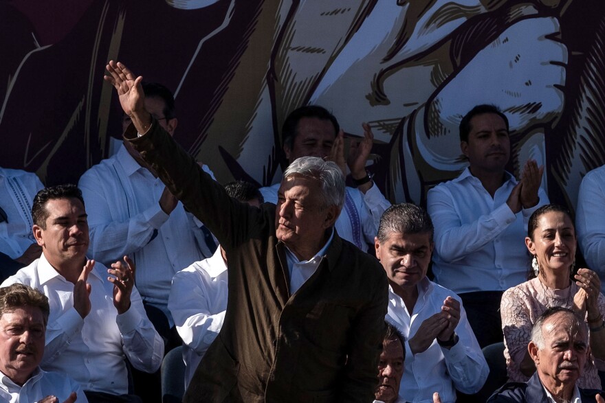 Mexican President Andres Manuel Lopez Obrador waves as he arrives to a rally to 'defend mexican dignity' in Tijuana, Baja California state, Mexico on June 8, 2019. - Mexican President Andres Manuel Lopez Obrador on Saturday hailed his government's deal to avert US tariffs in return for curbing migration, saying "there will not be an economic or financial crisis in Mexico." (Photo by Guillermo Arias / AFP)        (Photo credit should read GUILLERMO ARIAS/AFP/Getty Images)