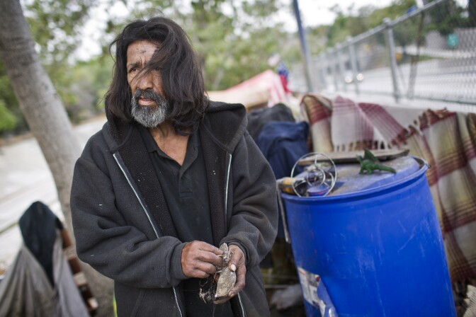 Jesus Torres has lived in the Arroyo Seco riverbed for almost three years. Torres was born in the city of LA during the time of the Watts Riots in 1965. Dozens of encampments have taken root in and around the Arroyo Seco riverbed in the past several years and are now visible along the 110 Freeway.