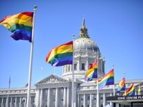 Rainbow flags line the courtyard at San Francisco's City Hall building on June 26, 2012. The US Supreme Court struck down The Defense of Marriage Act (DOMA), and declared that same-sex couples who are legally married deserve equal rights to the benefits under federal law that go to all other married couples. In another ruling, the Supreme Court cleared the way for same-sex marriages to resume in California as the justices, in a procedural ruling, turned away the defenders of Proposition 8.