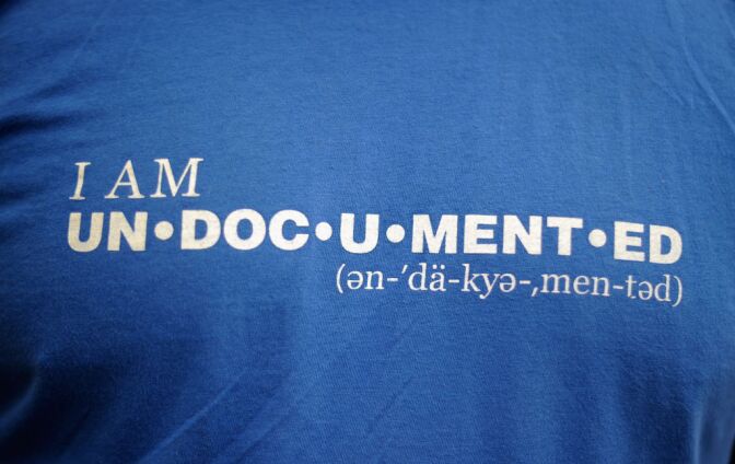 Students wearing t-shirts during a demonstration by immigrant student for an end to deportations and urge relief by governmental agencies for those in deportation proceedings on June 15, 2012 in Los Angeles, California. In a policy change, the Obama administration said it will stop deporting young illegal immigrants who entered the United States as children if they meet certain requirements.   
