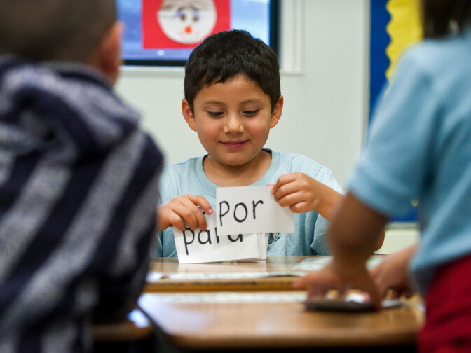 Transitional kindergarten dual language student Jesus Lopez goes through a keycard exercise with his classmates on Wednesday, March 20 at Foster Elementary School. Half of the school is in a dual language program, and the other half of the students are taught in English only.
