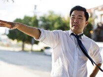 Los Angeles City Councilman David Ryu of District 4 walks around Van Nuys-Sherman Oaks War Memorial Park on Thursday afternoon, Oct. 15, 2015. The park is one of several areas where Ryu knocked on doors leading up to his election.