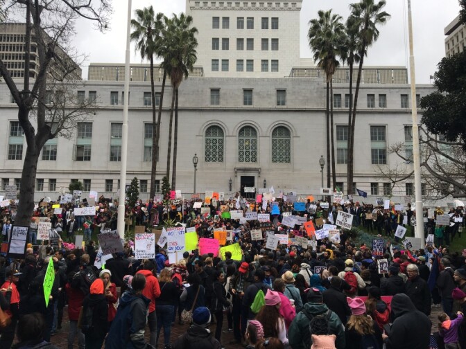 Some of an estimated 1,000 protestors gather at Los Angeles City Hall as part of the "Not My President's Day" march.
