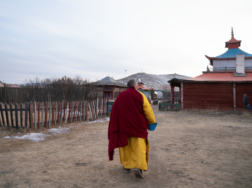 Over half of Mongolia's population identifies as Buddhist. Herders in Arkhangai province who were affected by the 2009-2010 <em>dzud</em> sought spiritual counsel at a temple in the district of Tsenkher.