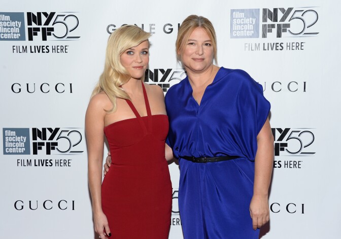 Producers Reese Witherspoon, left, and  Bruna Papandrea attend the opening night gala world premiere of "Gone Girl" during the 52nd New York Film Festival at Alice Tully Hall on Friday, Sept. 26, 2014, in New York. (Photo by Evan Agostini/Invision/AP)