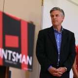 HANOVER, NH - OCTOBER 11:  Former Utah governor and Republican presidential canididate Jon Huntsman looks on with his wife Mary Kaye during a town hall style meeting at the Kendal Retirement Community on October 11, 2011 in Hanover, New Hampshire.  Jon Hunstman made a last minute campaign stop before a presidential debate at Dartmouth College.  (Photo by Justin Sullivan/Getty Images)