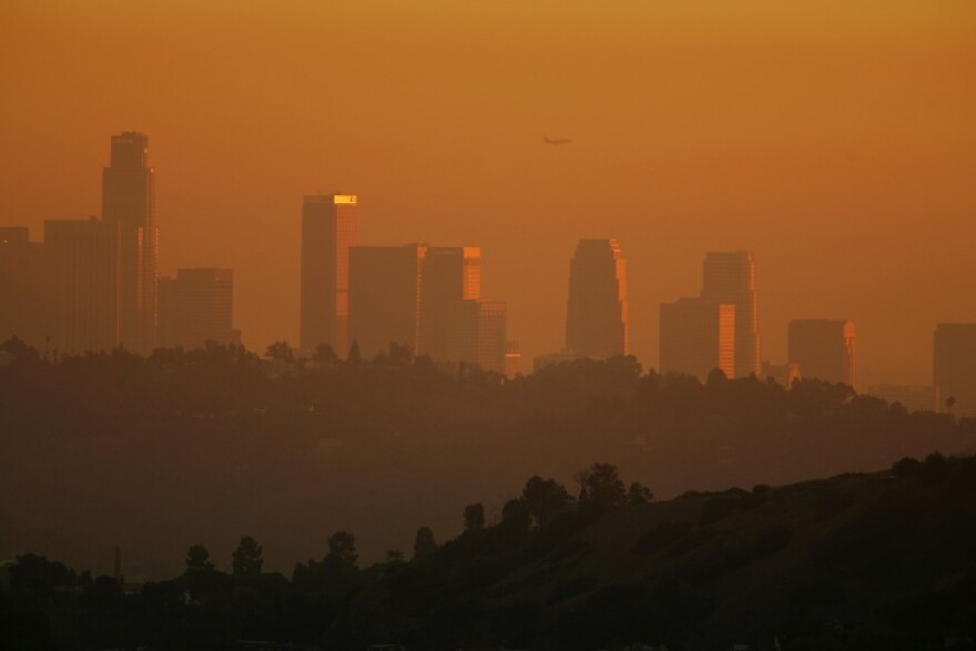 The downtown skyline is enveloped in smog shortly before sunset on November 17, 2006 in Los Angeles.