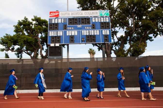 Students at Santa Monica college walk towards their graduation on June 11th, 2013.