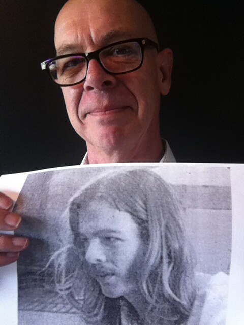 Take Two producer Steve Proffitt holds up his awkward teenage photo. 