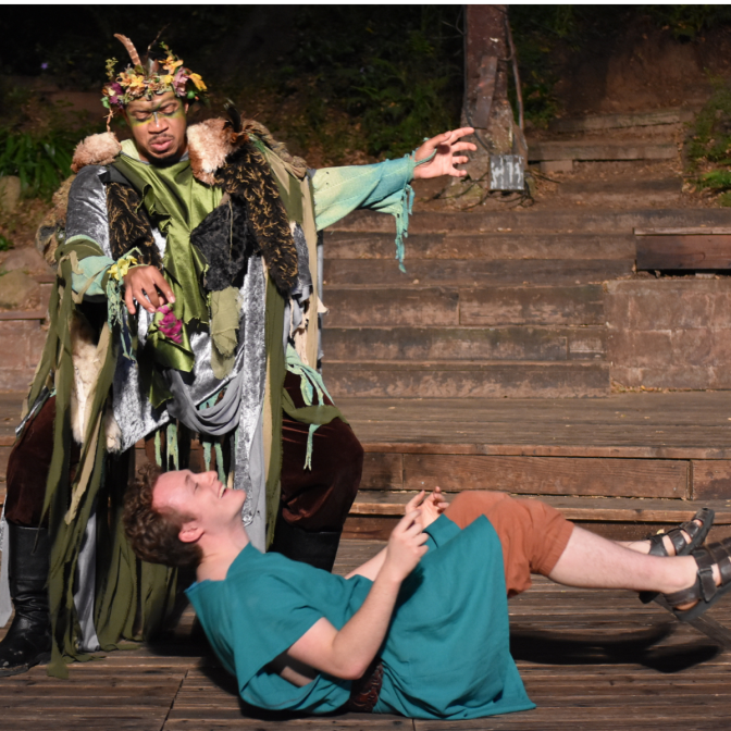 Two individuals performing a play