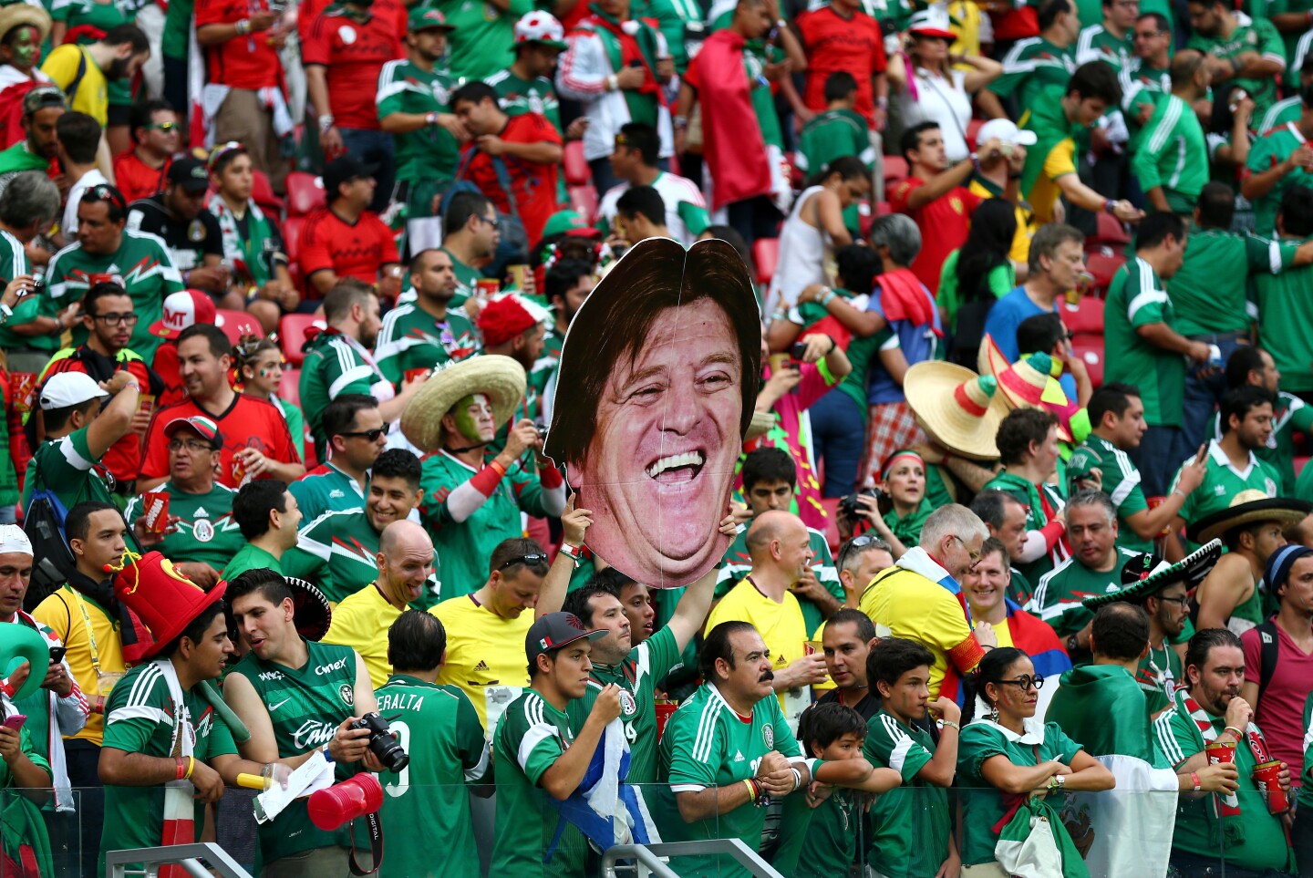 Mexico fans hold up a cutout of head coach Miguel Herrera during the 2014 FIFA World Cup Brazil Group A match between Croatia and Mexico at Arena Pernambuco on June 23, 2014 in Recife, Brazil.  