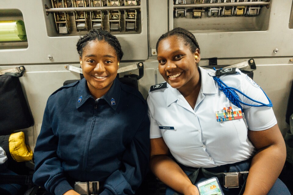 Air Force Junior Reserve Officer Training Corps cadet Alicia Spencer (right) is studying chemistry to work in forensic science someday.