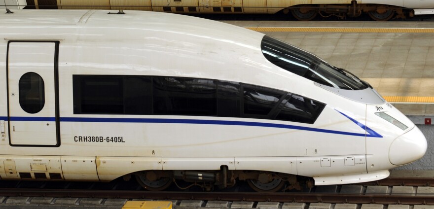 A picture taken on August 11, 2011 show a CRH380BL bullet train sitting at Beijing south railway station.  State-owned Chinese train manufacturer China CNR Corp said it is recalling 54 of its CRH380BL bullet trains being used on a new high-speed rail link between Beijing and Shanghai because of "flaws". AFP PHOTO/Peter PARKS (Photo credit should read PETER PARKS/AFP/Getty Images)