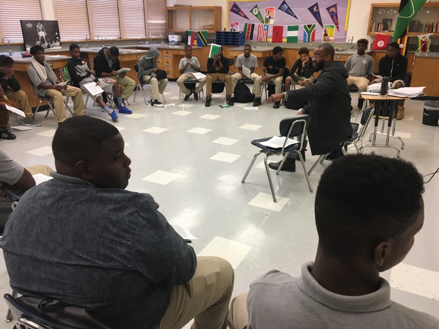 Locke High School math teacher Eric Strong leads the group of students in the "See A Man, Be A Man" program. "SAMBAM," for short, is a program designed to connect young African-American students with role models and mentors.